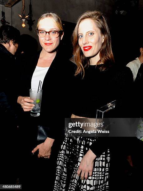 Chloe Sevigny and Liz Goldwyn attend the premiere after party of A24's "Under The Skin" at Umami Burger on March 25, 2014 in Los Angeles, California.