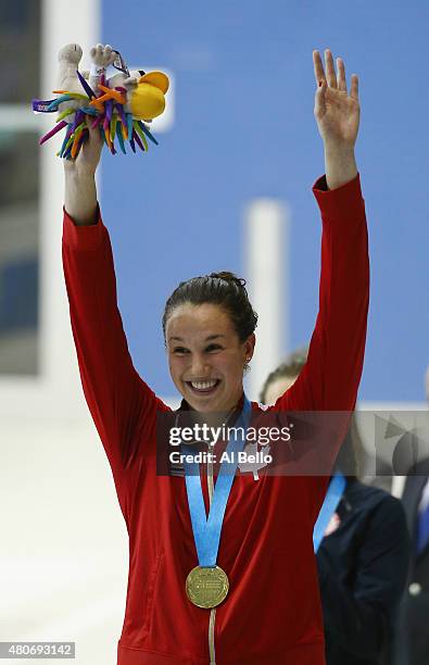 Chantal Van Landeghem of Canada reacts after winning the Women's 100m gold medal at the Pan Am Games on July 14, 2015 in Toronto, Canada.