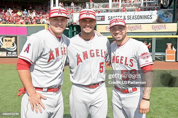 Mike Trout, Albert Pujols, and Hector Santiago, all of the Los Angeles Angels of Anaheim pose for a picture prior to the start of the 86th MLB...