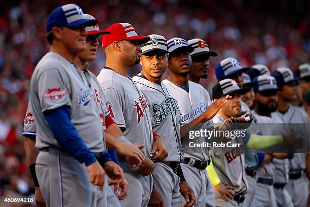 American League All-Star Albert Pujols of the Los Angeles Angels of Anaheim talks with American League All-Star Nelson Cruz of the Seattle Mariners...