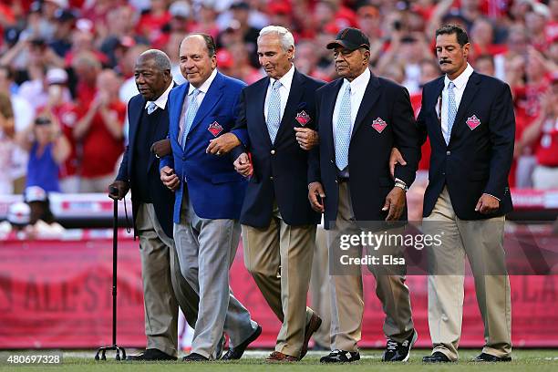 Hall of Famers Hank Aaron, Johnny Bench, Sandy Koufax and Willie Mays walk on the field prior to the 86th MLB All-Star Game at the Great American...