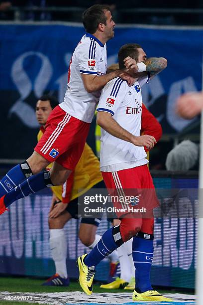 Pierre Michel Lasogga of Hamburg celebrates after scoring their first goal during the Bundesliga match between Hamburger SV and SC Freiburg at Imtech...