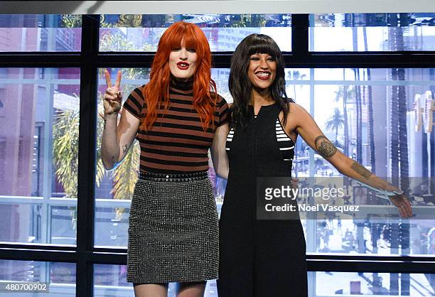Caroline Hjelt and Aino Jawo of Icona Pop visit "Extra" at Universal Studios Hollywood on July 14, 2015 in Universal City, California.