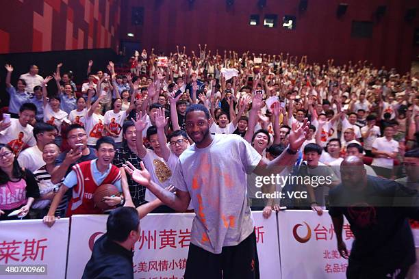 American retired professional basketball player Tracy McGrady meets fans at Outlets Plaza on July 14, 2015 in Taizhou, China.