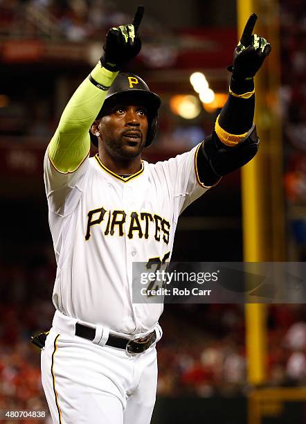 National League All-Star Andrew McCutchen of the Pittsburgh Pirates celebrates after scoring a solo home run in the sixth inning against American...