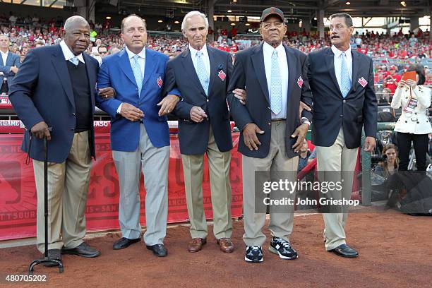 Hank Aaron, Johnny Bench, Sandy Koufax, and Willie Mays walk onto the field to be honored as the Greatest Living Players prior to the start of the...