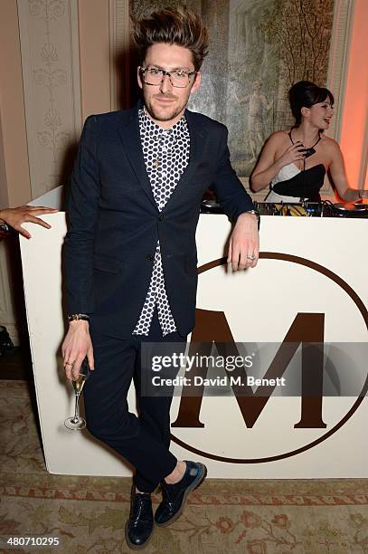 Henry Holland and Gizzi Erskine attend a party to celebrate 25 years of Magnum at Home House on March 26, 2014 in London, England.