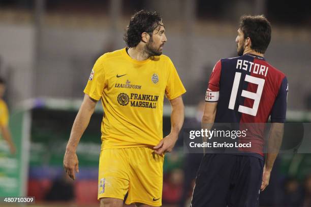 Davide Astori of Cagliari and Luca Toni of Verona during the serie A match between Cagliari Calcio and Hellas Verona FC at Stadio Sant'Elia on March...