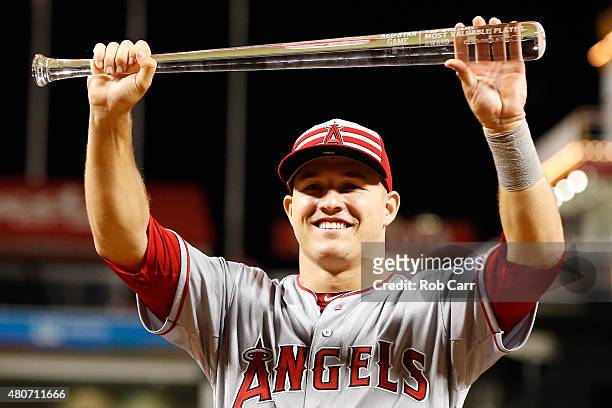 American League All-Star Mike Trout of the Los Angeles Angels of Anaheim poses with the MVP trophy after defeating the National League 6 to 3 in the...