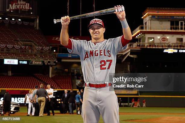 American League All-Star Mike Trout of the Los Angeles Angels of Anaheim poses with the MVP trophy after defeating the National League 6 to 3 in the...