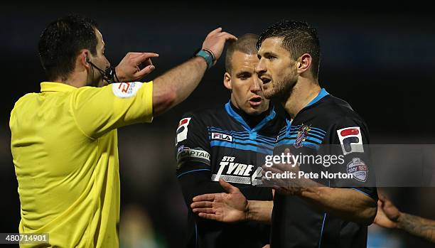 Referee Tim Robinson waves away the protest of John Mousinho of Stevenage after awarding a penalty to Coventry City during the Sky Bet League One...