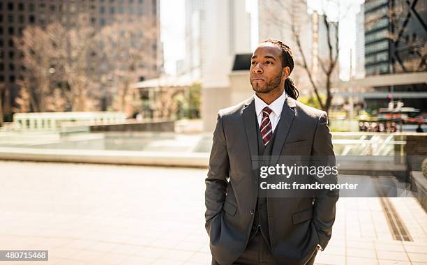 business man standing on the city of tokyo - blank expression stock pictures, royalty-free photos & images