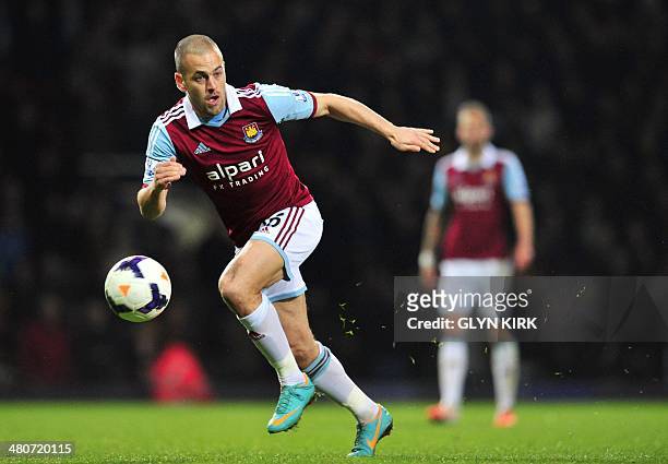 West Ham United's English midfielder Joe Cole runs after the ball during the English Premier League football match between West Ham United and Hull...
