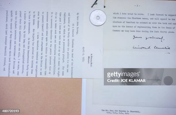 Typed letter signed by Winston Churchill as Prime Minister, announcing his resignation from office dated April6 1955, is displayed at the Nate D....