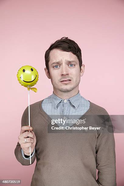 Actor Elijah Wood is photographed for Entertainment Weekly Magazine on January 25, 2014 in Park City, Utah.