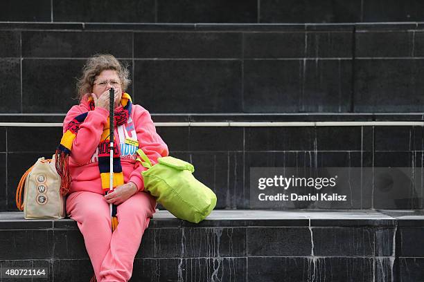 Crows supporter is pictured outside Adelaide Oval at the memorial for Phil Walsh service at the Adelaide Oval on July 15, 2015 in Adelaide,...