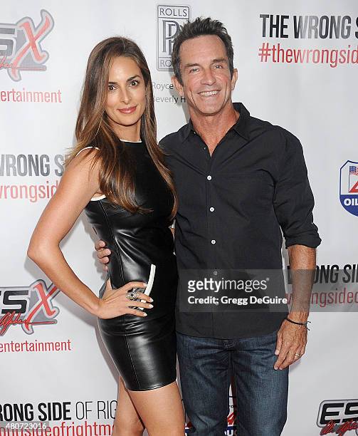 Personality Jeff Probst and wife Lisa Ann Russell arrive at the premiere of ESX Productions' "The Wrong Side Of Right" at TCL Chinese Theatre on July...
