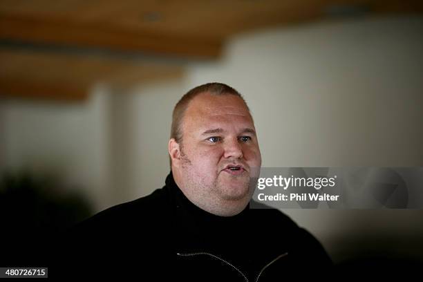 Kim Dotcom reads a statement to media after the Internet Party was launched at the Dotcom Mansion on March 27, 2014 in Auckland, New Zealand. The...