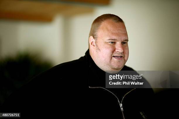 Kim Dotcom reads a statement to media after the Internet Party was launched at the Dotcom Mansion on March 27, 2014 in Auckland, New Zealand. The...