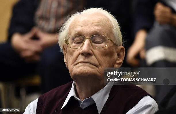 Convicted former SS officer Oskar Groening listens to the verdict of his trial on July 15, 2015 at court in Lueneburg, northern Germany. Oskar...