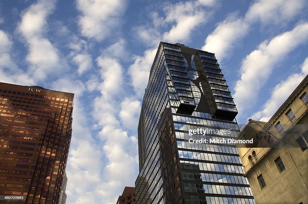 Downtown buildings with cloud reflections