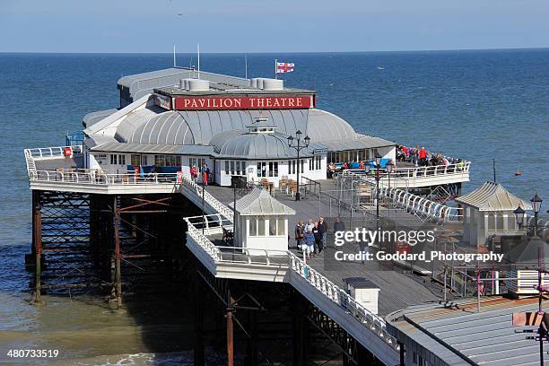 cromer pier and cromer pavilion theatre - cromer pier stock pictures, royalty-free photos & images