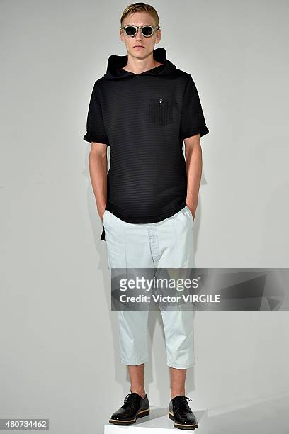 Model walks the runway at the Matiere Presentation during New York Fashion Week: Men's S/S 2016 at Industria Superstudio on July 13, 2015 in New York...
