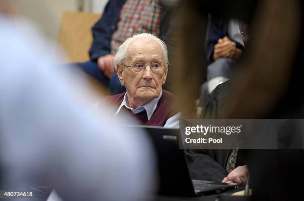 Oskar Groening a former member of the Waffen-SS who worked at the Auschwitz concentration camp during World War II, awaits the verdict in his trial...