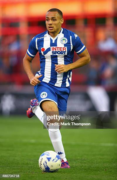 Reece McNally of Wigan Athletic in action during the pre season friendly between Altrincham and Wigan Athletic at the J Davidson stadium on July 14,...