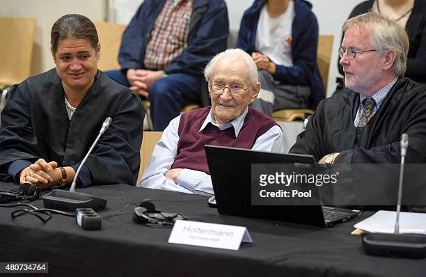 Oskar Groening a former member of the Waffen-SS who worked at the Auschwitz concentration camp during World War II, awaits the verdict in his trial...
