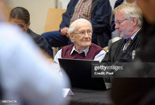 Oskar Groening a former member of the Waffen-SS who worked at the Auschwitz concentration camp during World War II, awaits the verdict in his trial...