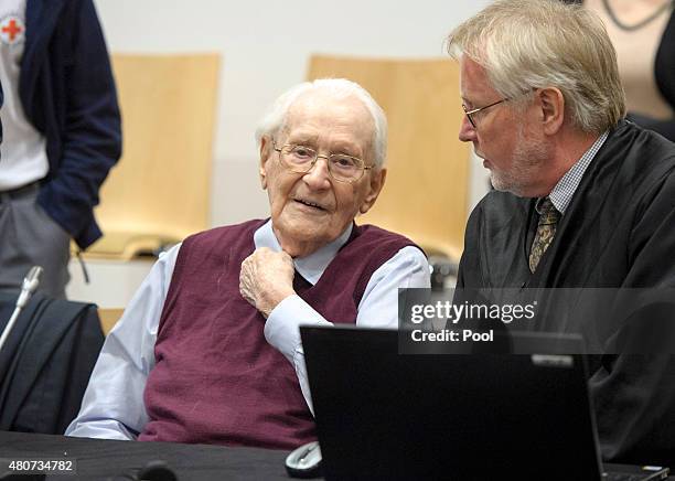 Oskar Groening a former member of the Waffen-SS who worked at the Auschwitz concentration camp during World War II, awaits the verdict in his trial...