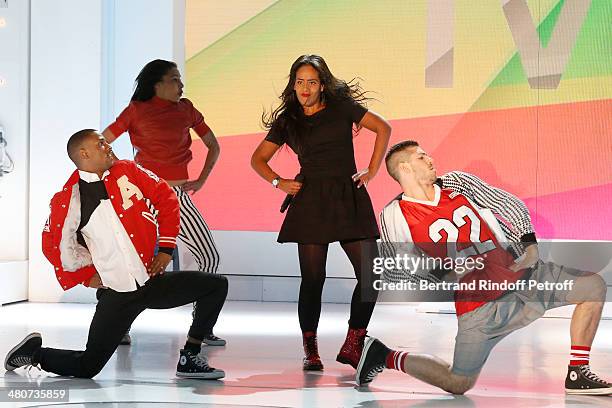 Singer Amel Bent and dancers performs on stage during the recording of television show host's Michel Drucker's 'Vivement Dimanche' weekly show at...