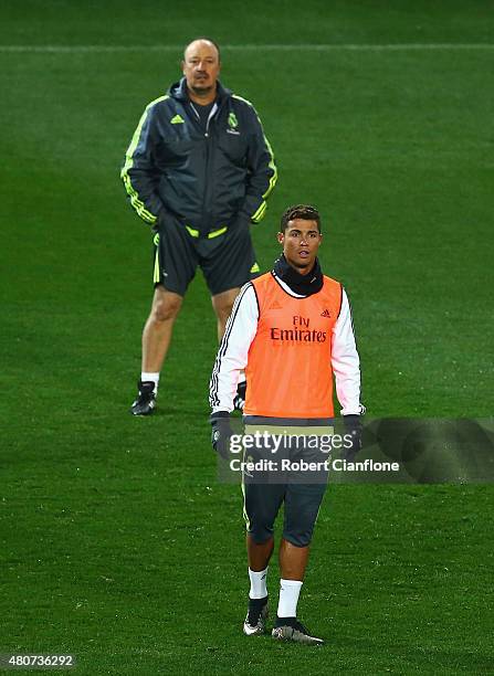 Cristiano Ronaldo of Real Madrid and head coach Rafael Benitez look on during Real Madrid training session at Melbourne Cricket Ground on July 15,...