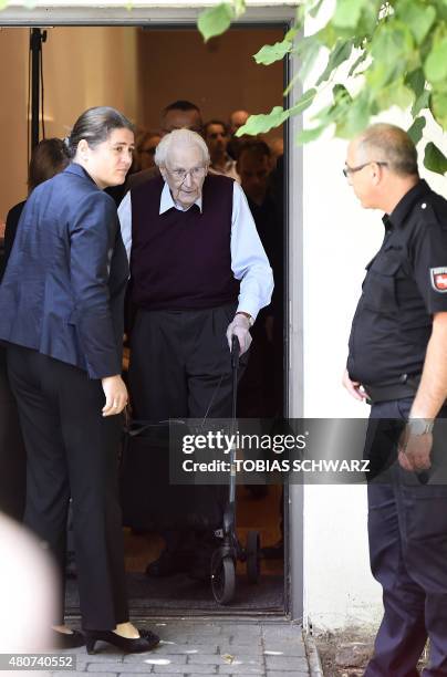 Convicted former SS officer Oskar Groening leaves after the verdict in his trial on July 15, 2015 at court in Lueneburg, northern Germany. Oskar...