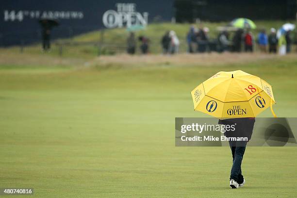 An umbrella is seen as rain comes down ahead of the 144th Open Championship at The Old Course on July 15, 2015 in St Andrews, Scotland.