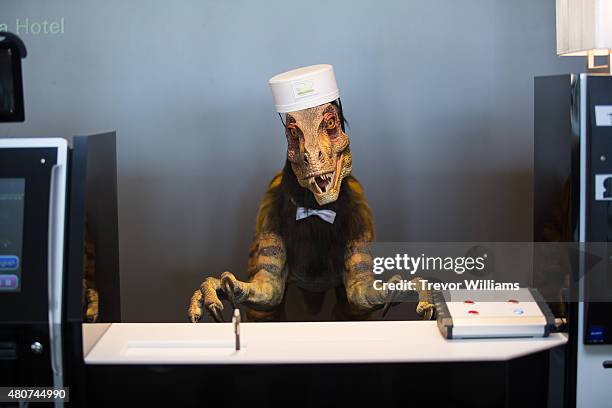 Robotic dinosaur replaces human staff at the check in counter at the Henna Hotel in Huis Ten Bosch, Netherlands themed amusement park on July 15,...