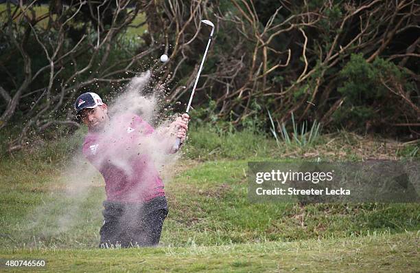 Sergio Garcia of Spain hits out of a bunker during a practice round ahead of the 144th Open Championship at The Old Course on July 15, 2015 in St...