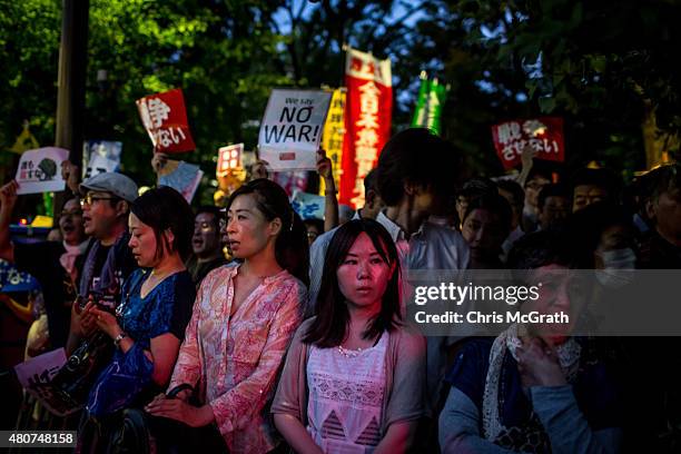 People protest outside the National Diet on July 15, 2015 in Tokyo, Japan. Protesters gathered after the ruling Liberal Democratic Party pushed the...