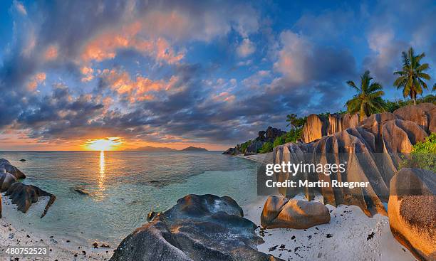 anse source d´argent beach at sunset. - seychellen stock-fotos und bilder