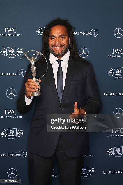 Christian Karembeu poses with the Laureus trophy during the 2014 Laureus World Sports Awards at the Istana Budaya Theatre on March 26, 2014 in Kuala...