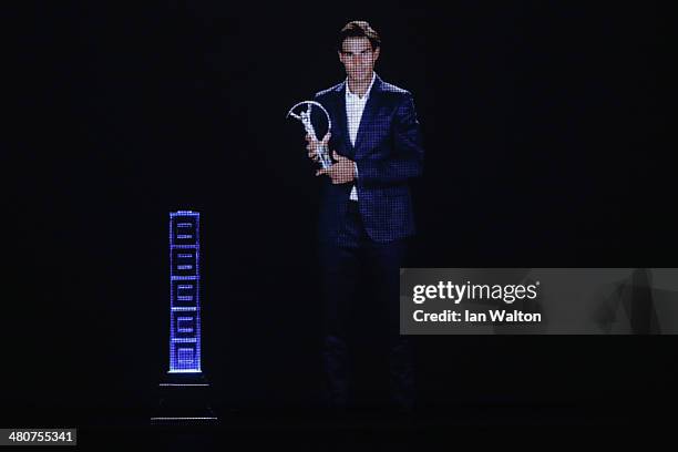 Rafael Nadal accepts his award for Laureus World Comeback of the Year via video during the 2014 Laureus World Sports Award show at the Istana Budaya...