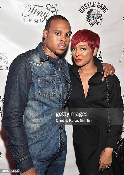 Player Shannon Brown and recording artist Monica Brown attend Tiny Harris Celebrity Birthday Celebration at Scales 925 on July 14, 2015 in Atlanta,...