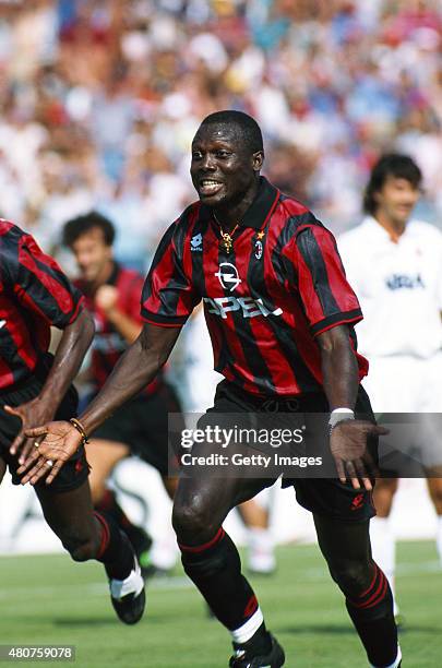 Milan forward George Weah celebrates after scoring during a Serie A match between Padova and Milan on August 27, 1995 in Italy.