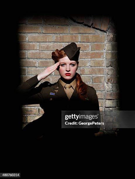 retro woman soldier saluting - military medal stock pictures, royalty-free photos & images