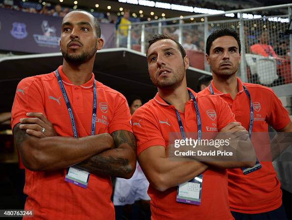 Theo Walcott, Santi Cazorla and Mikel Arteta of Arsenal before the