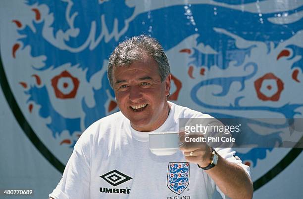 Manager Terry Venables holding a cup of tea at a training session of the England national football team at the Bisham Abbey sports centre in...