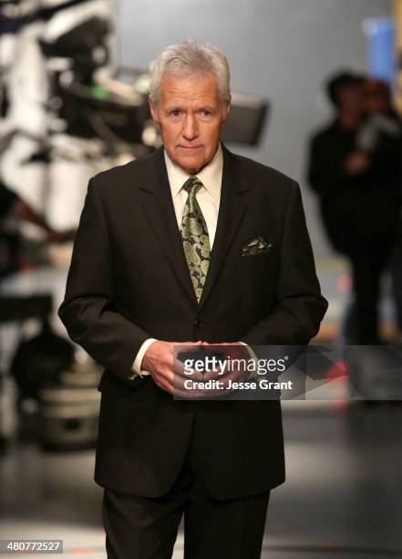 Alex Trebek appears onstage during "Hot In Cleveland" LIVE! at the CBS Studio Center on March 26, 2014 in Studio City, California.