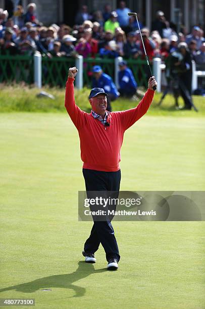 Tom Weiskopf of the United States celebrates his putt on the18th green during the Champion Golfers' Challenge ahead of the 144th Open Championship at...