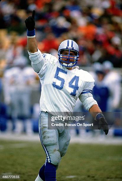 Chris Spielman of the Detroit Lions celebrates after making a play against the Chicago Bears during an NFL football game December 10, 1989 at Soldier...